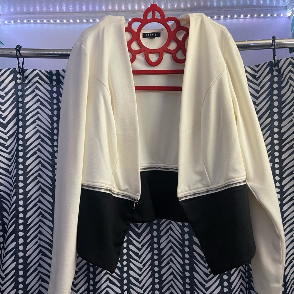 Black and cream color blazer